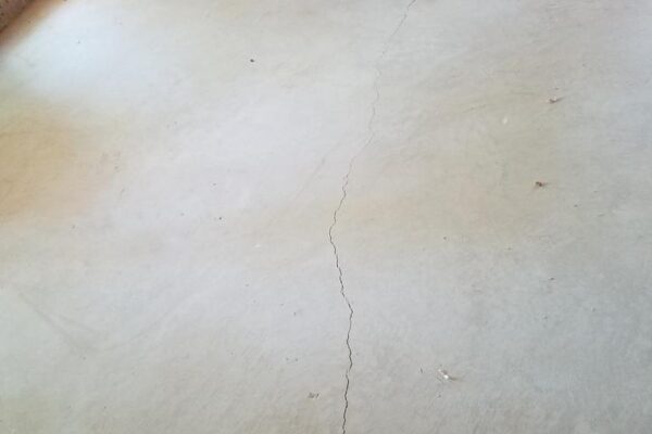 I have some hairline cracks in my basement floor, should I be concerned?