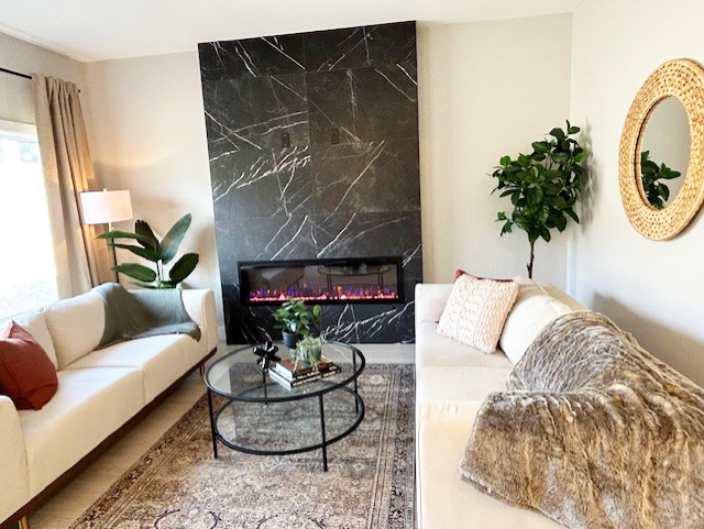 Living room with upgraded tile fireplace